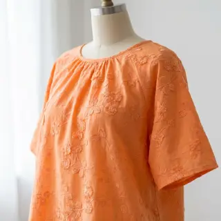 Țesătură din bumbac EMBROIDERY Catchy leaves orange